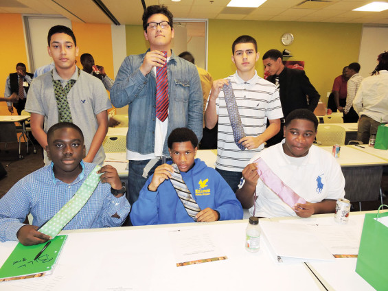 Shown with their ties are Bush High School students (seated from left) William Pamptey, William Andrews, Chris Richard; and (standing) Jonathan Flores, Alberto Nazurio and Rodolfo Garcia.