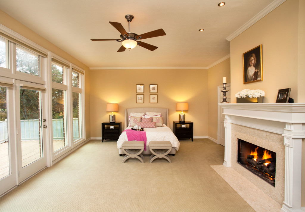 A cleanlined Restoration Hardware bed swathed in bedding from Serena & Lily makes a sophisticated, yet casual statement in the master bedroom.