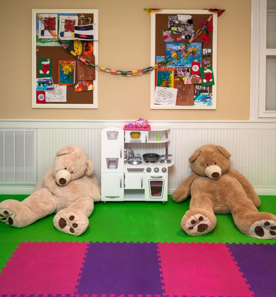 The twins find plenty to keep them busy in their fun playroom downstairs.