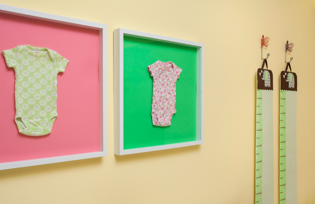  Twin  3-year-old girls keep this house humming. Here, mementoes from babyhood grace a bedroom wall.  