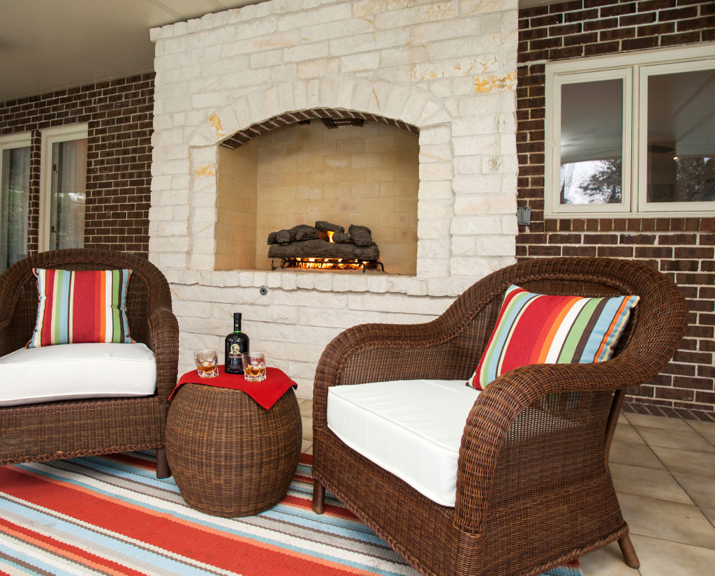Scene from a winter day: Drinks on the back porch with a nice fire behind.