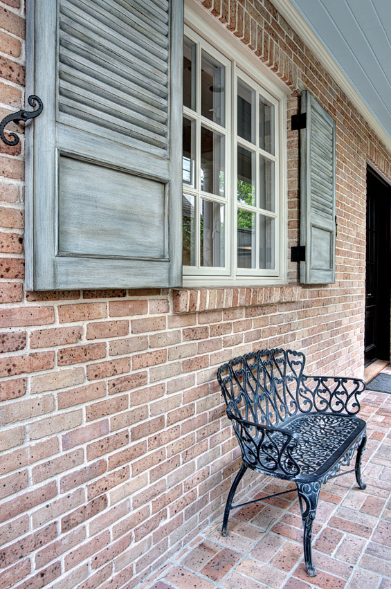 The mahogany shutters on the home’s exterior were added after the Strouhals moved in. Segreto Finishes distressed and aged them to give that ‘been there forever’ feeling.