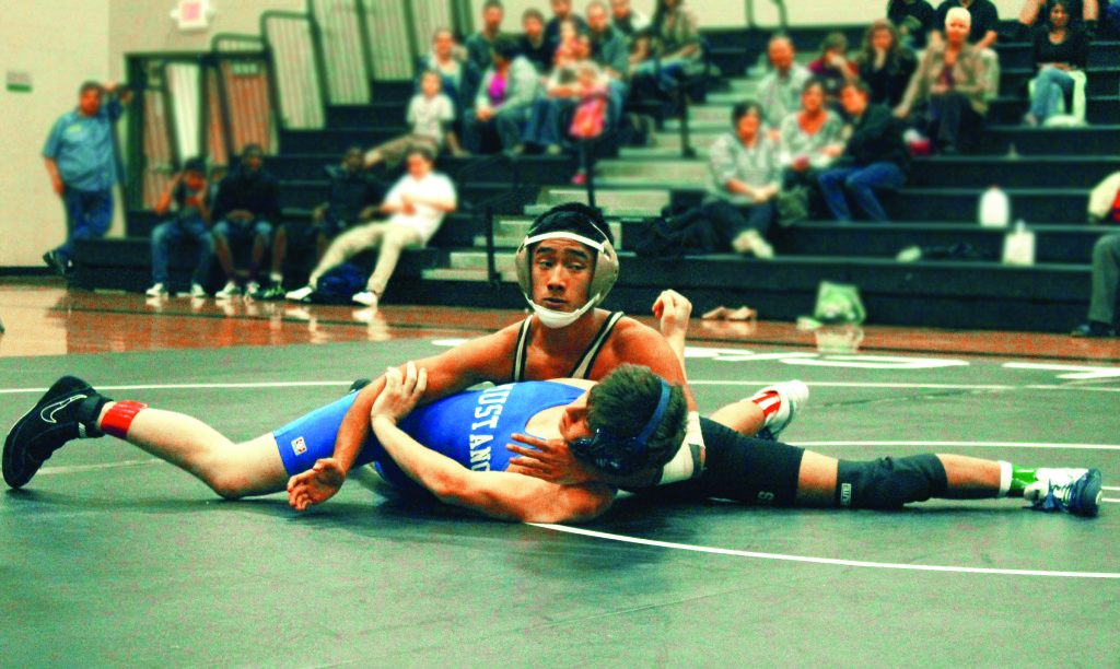 Jonny Nguyen won the district and regional championships in his weight class.