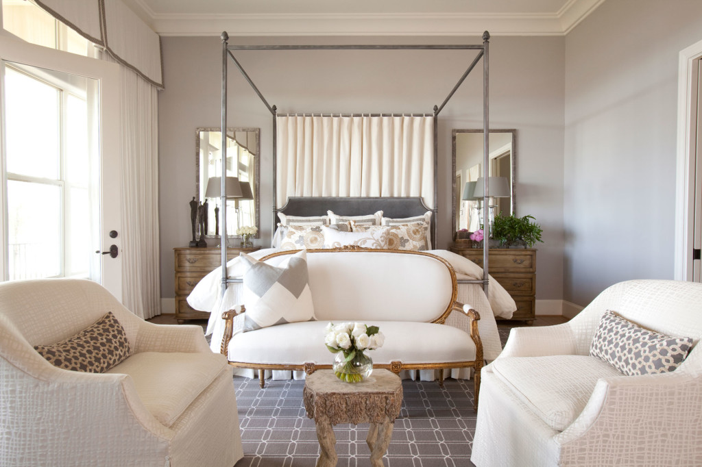 The master bedroom offers the homeowners a serene getaway. Custom chairs custom by the Joseph Company; custom bed Peck and Company; custom bedding by Julie Dodson; pillows from Plush Home and Vieux.