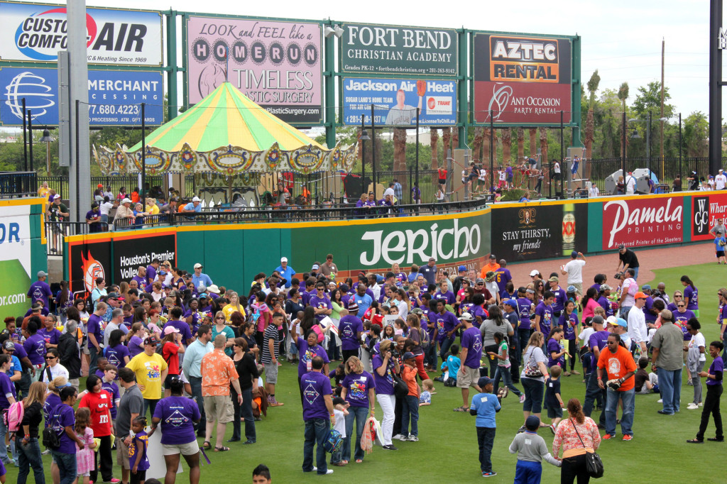 More than 300 volunteers and 400 family members get ready for a pre-game parade at last year’s event