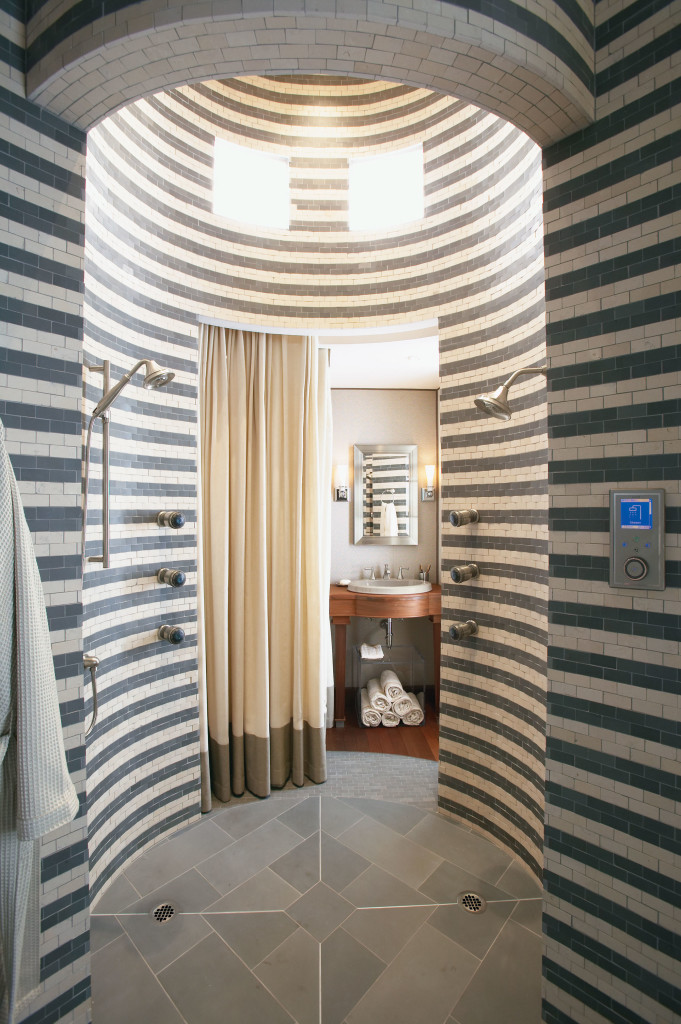 Eric Cohler's designer bathroom positions the shower as an entryway, encouraging the feeling – if not the act of – cleansing oneself prior to entering the bathroom. Spa Tower draws on Renaissance architecture to create a feeling of elegance while accentuating the soaring tower design of the shower.