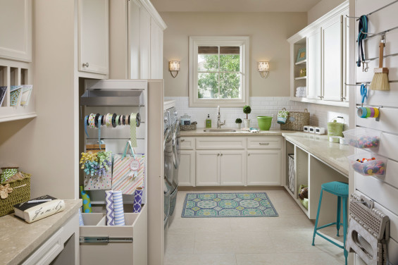 The service kitchen directly across from the kitchen provides secondary appliances and houses a huge pantry, outfitted with a Proslat organizing system for maximum efficiency.