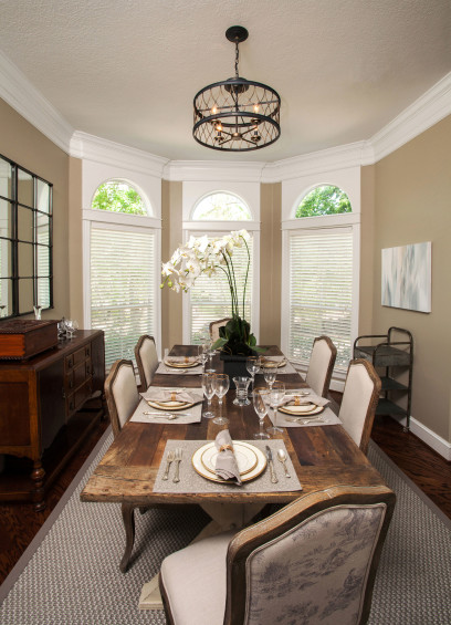 An eclectic mix of old and new kicks things up a notch in the dining room including an antique sideboard and a vintage medical drawer. 