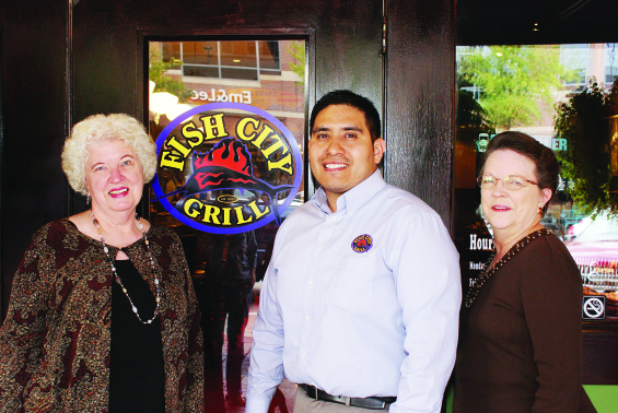 (L-R): Carole Kanusky, President; Joe Esparzo, Fish City Grill Manager and Marilyn Davis, Chair of Scholarship Committee.