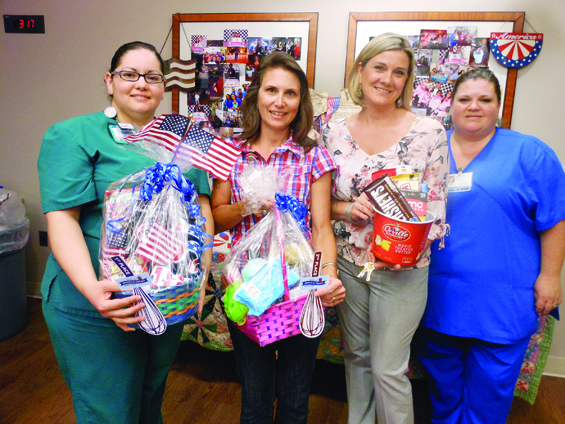 (L-R): Felipa Velasquez from Radiology took both 1st Place and the Employee Choice awards, Kelley Drabek from Physical Therapy took 2nd Place, and Jessica Hickman and Cathryn Oliver from Senior Behavioral Health Unit took 3rd place.