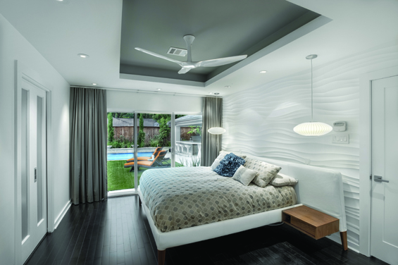 The homeowners can wake each morning in their Parallel bed from DWR and step out to their private oasis. Pangu wall panels add texture and interest. Floor to ceiling black-out drapes from G&S Draperies are perfect for sleeping in.