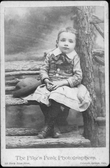 Cabinet card of Raymond Moore in dress, ca. 1889.