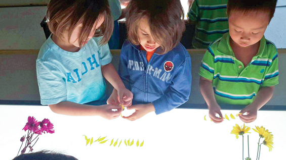 Shown are students with the new WIDE school in Missouri City. Newmark Homes sponsored the school’s recent Fort Bend Chamber of Commerce ribbon-cutting ceremony.