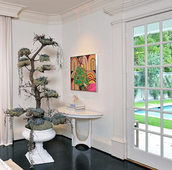 David Brown's bonsai arrangement reveals perfectly placed succulents perched on branches and moss strung as garland. Art by Jocelyn Hobbie.